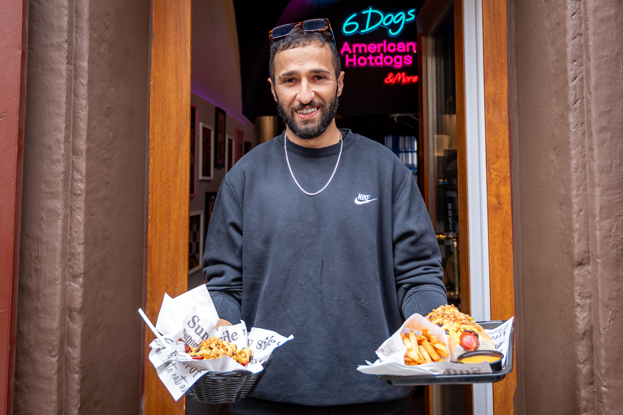 Ahmad Ziad Odah Haddad serves grilled beef hot dogs cooked on a lava stone grill for those craving American flavours (Photo: András Adorján)